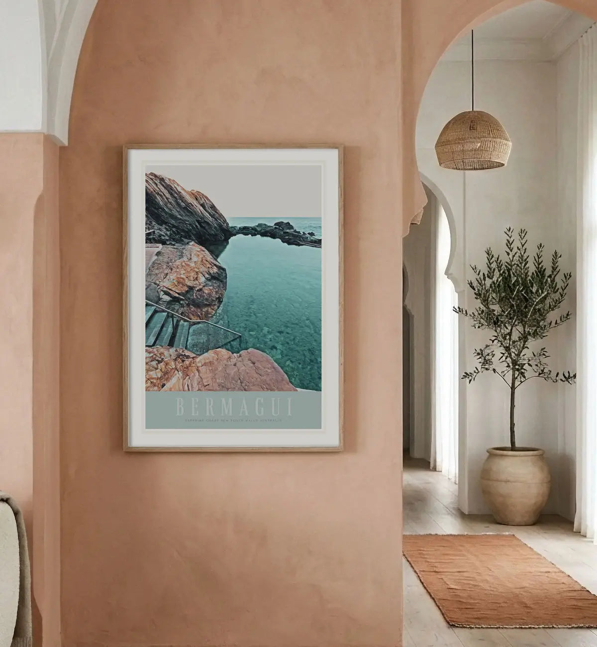 Bermagui NSW retro vintage poster print in oak frame in hallway by Places We Luv
